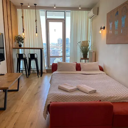 в аркадии в стиле лофт с большой лоджией прекрасным видом на море и город! *