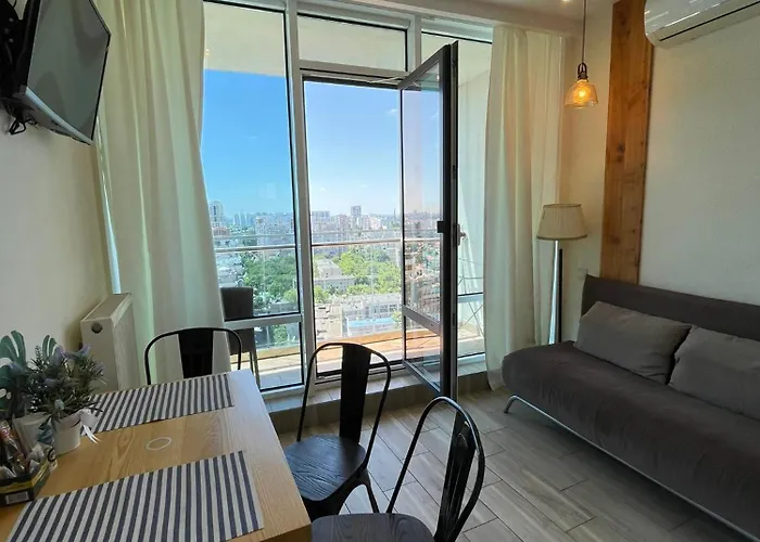 в аркадии в стиле лофт с большой лоджией прекрасным видом на море и город! Apartman *