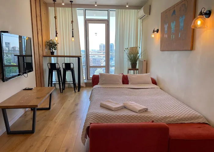 в аркадии в стиле лофт с большой лоджией прекрасным видом на море и город! *